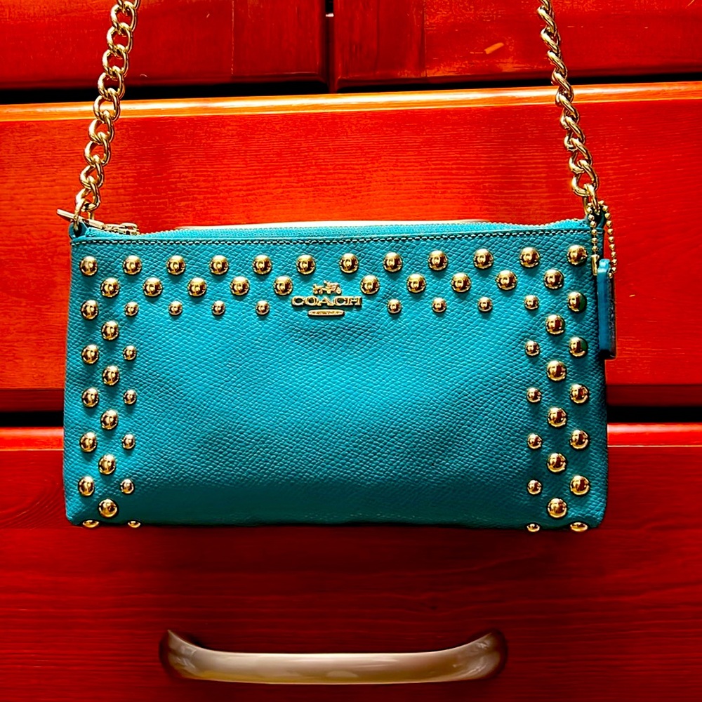 Coach turquoise blue cross body.